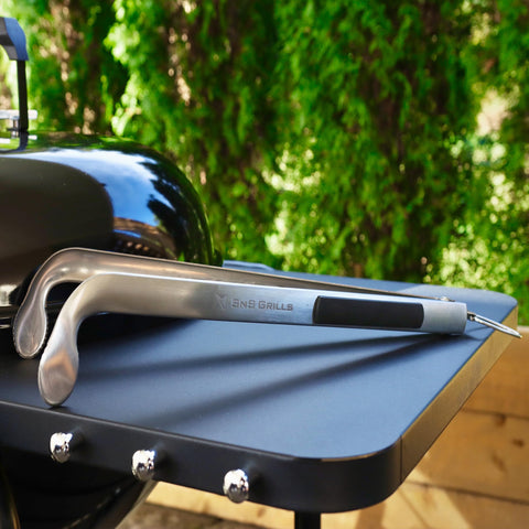 Slow 'N Sear Charcoal Cherry Picker showing rubber handle for comfortable grip