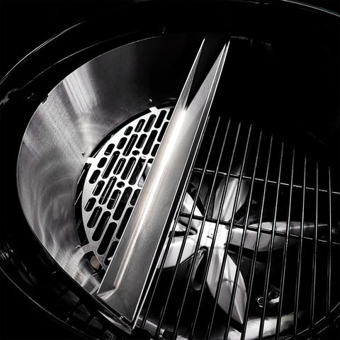 Slow 'N Sear Deluxe water reservoir shown for moisture during long cooks.
