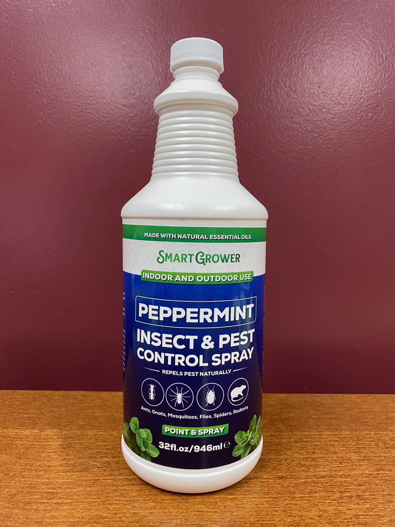 Smart Grower peppermint oil spray on outdoor patio for yard protection