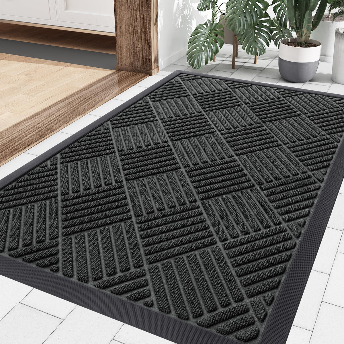 Smiry front door mat outside entrance 35x23 inches keeps dirt at bay.
