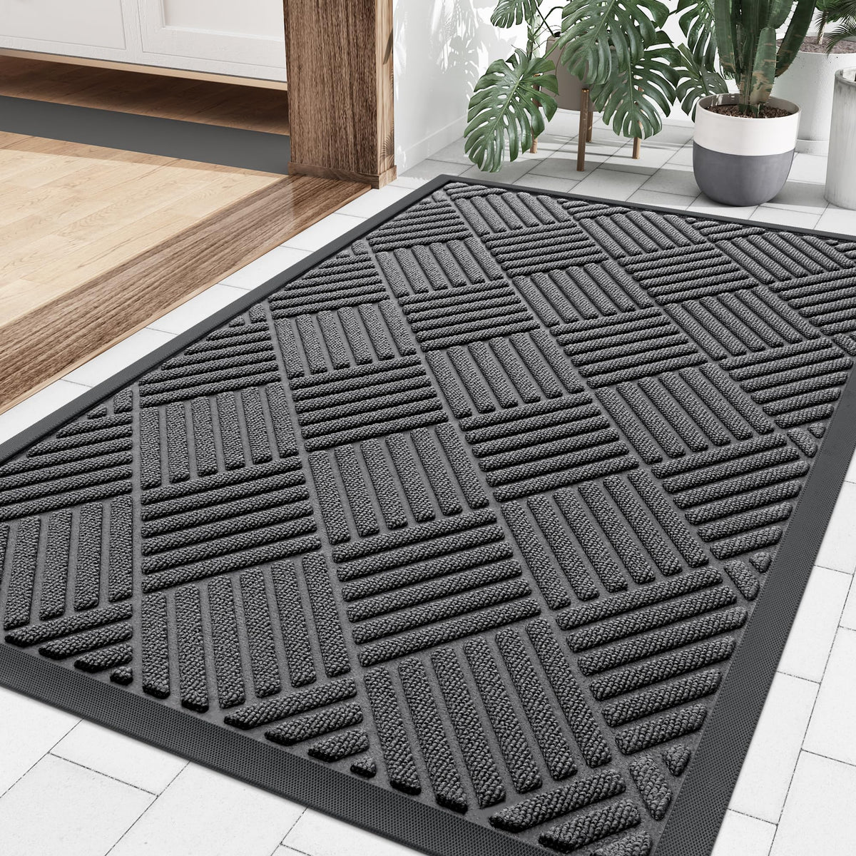 Smiry front door mat outdoors traps dirt and moisture at the entry.