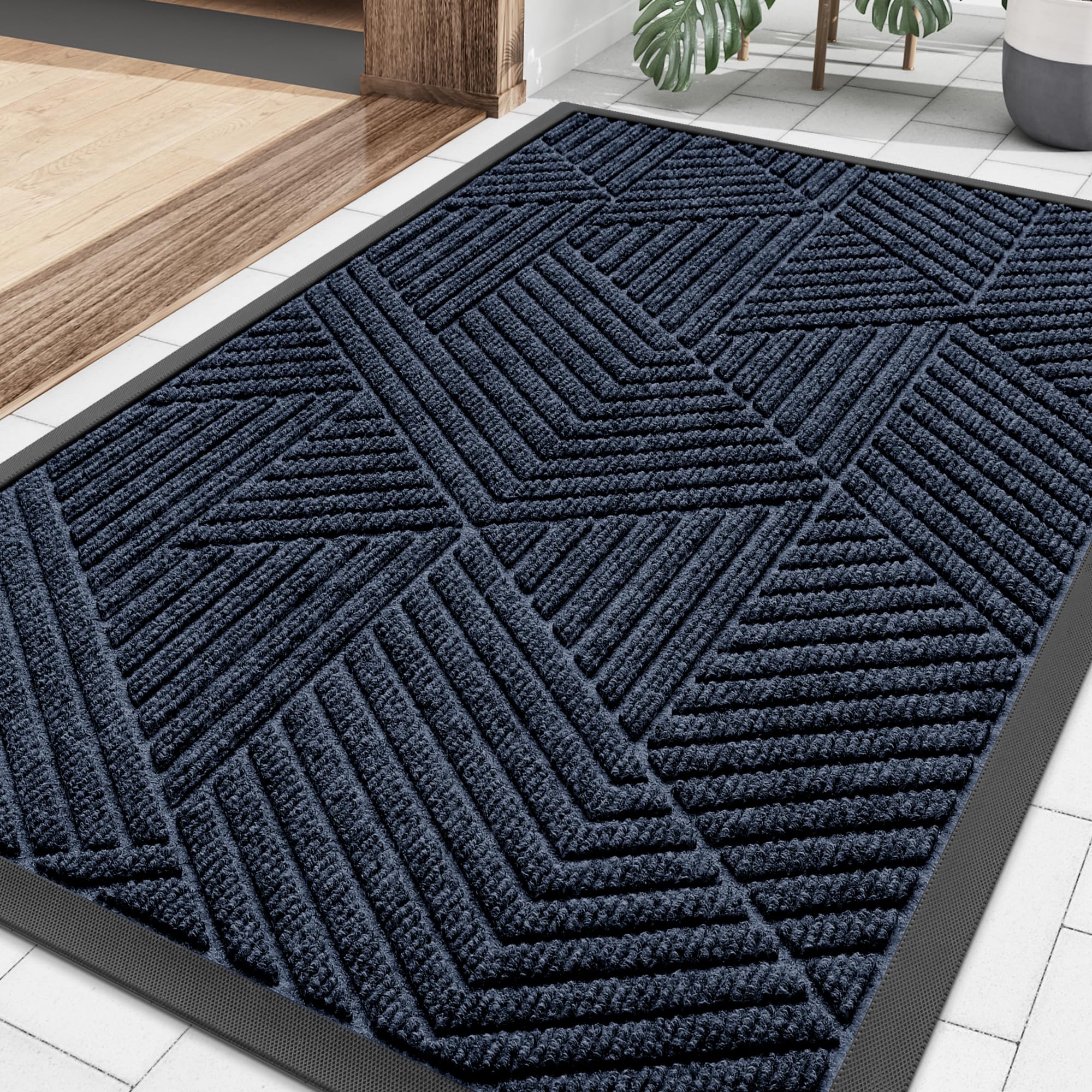 Smiry navy blue front door mat traps dirt at the entry for a cleaner home.