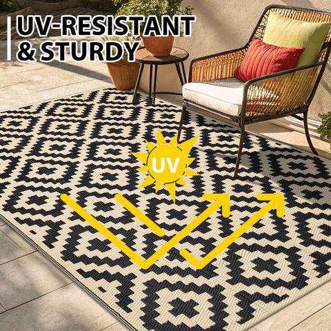 Smiry rug packing in carrying bag for easy transport to picnics or camping trips.
