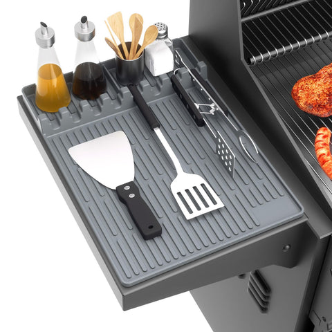 Snuggery silicone griddle tools mat on the side shelf catching drips.
