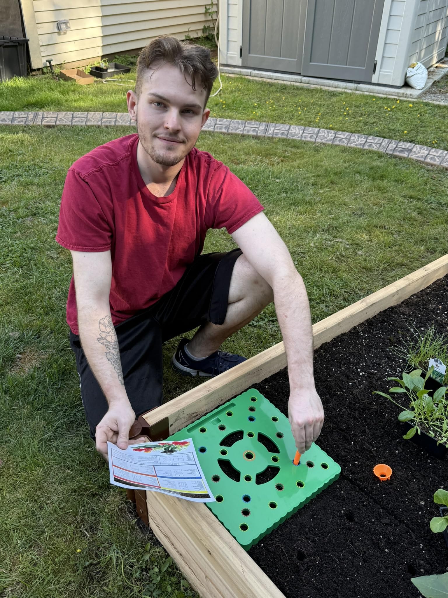 Snurfado Seed Spacer Tool supporting square-foot garden layout