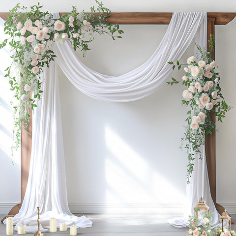 Socomi white sheer arch drape hangs softly for wedding ceremony backdrop