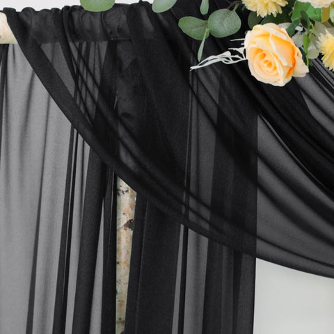 Socomi Black Sheer Floor Drape creates romantic flow for photos.