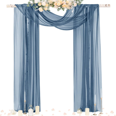 Socomi dusty blue sheer arch drape panel creates soft romantic backdrop for ceremonies