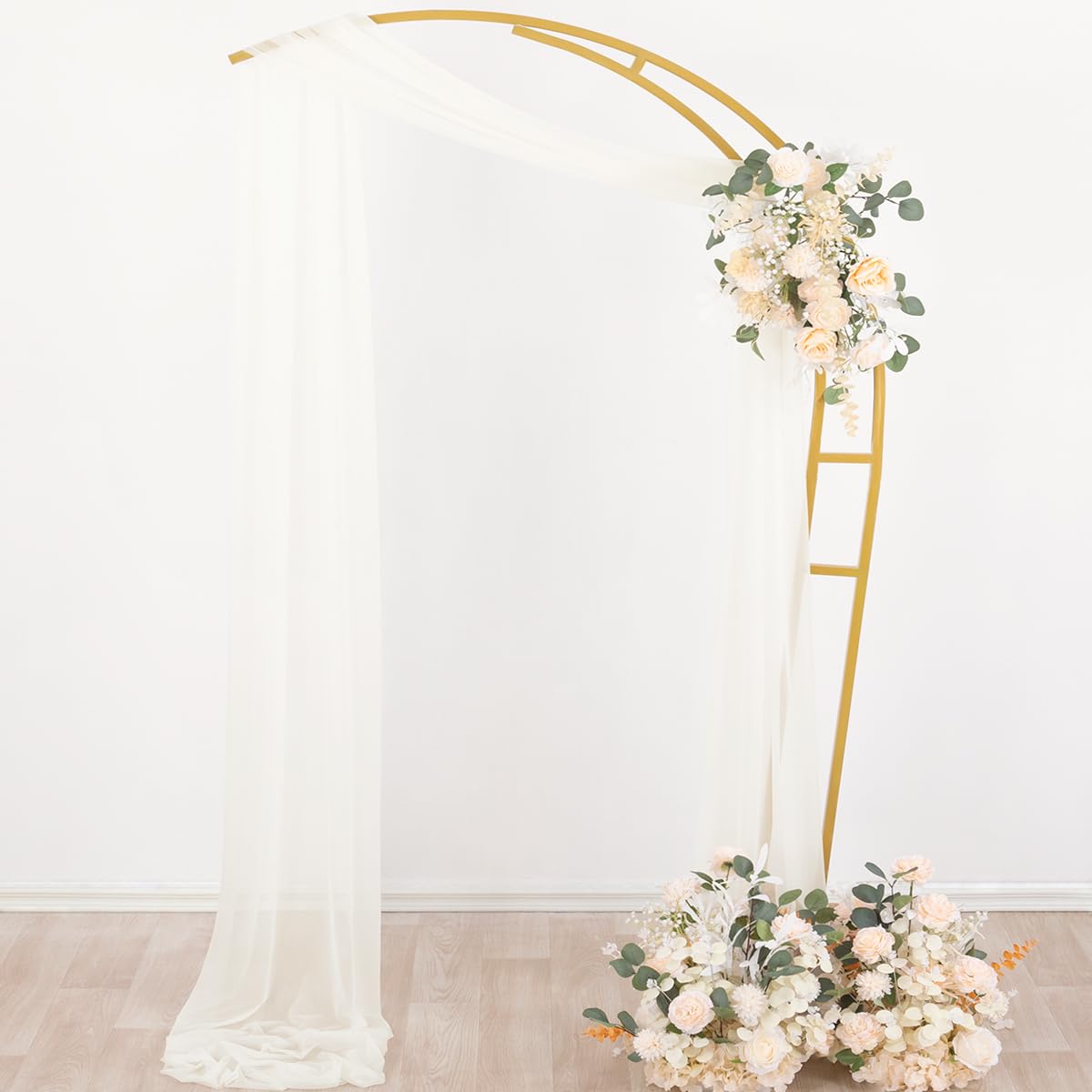 Socomi Ivory White draping fabric flowing to the floor, adds length and movement.