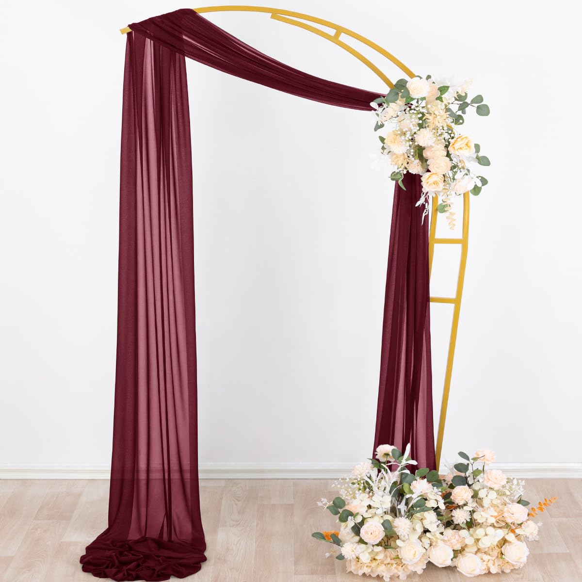 Socomi burgundy sheer drape used as party backdrop for baby showers.