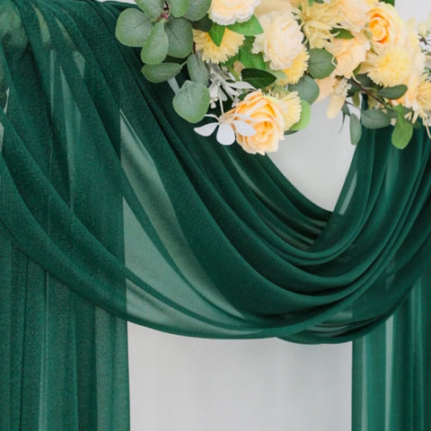 Panoramic view of Socomi emerald drapes creating a lush ceremony backdrop
