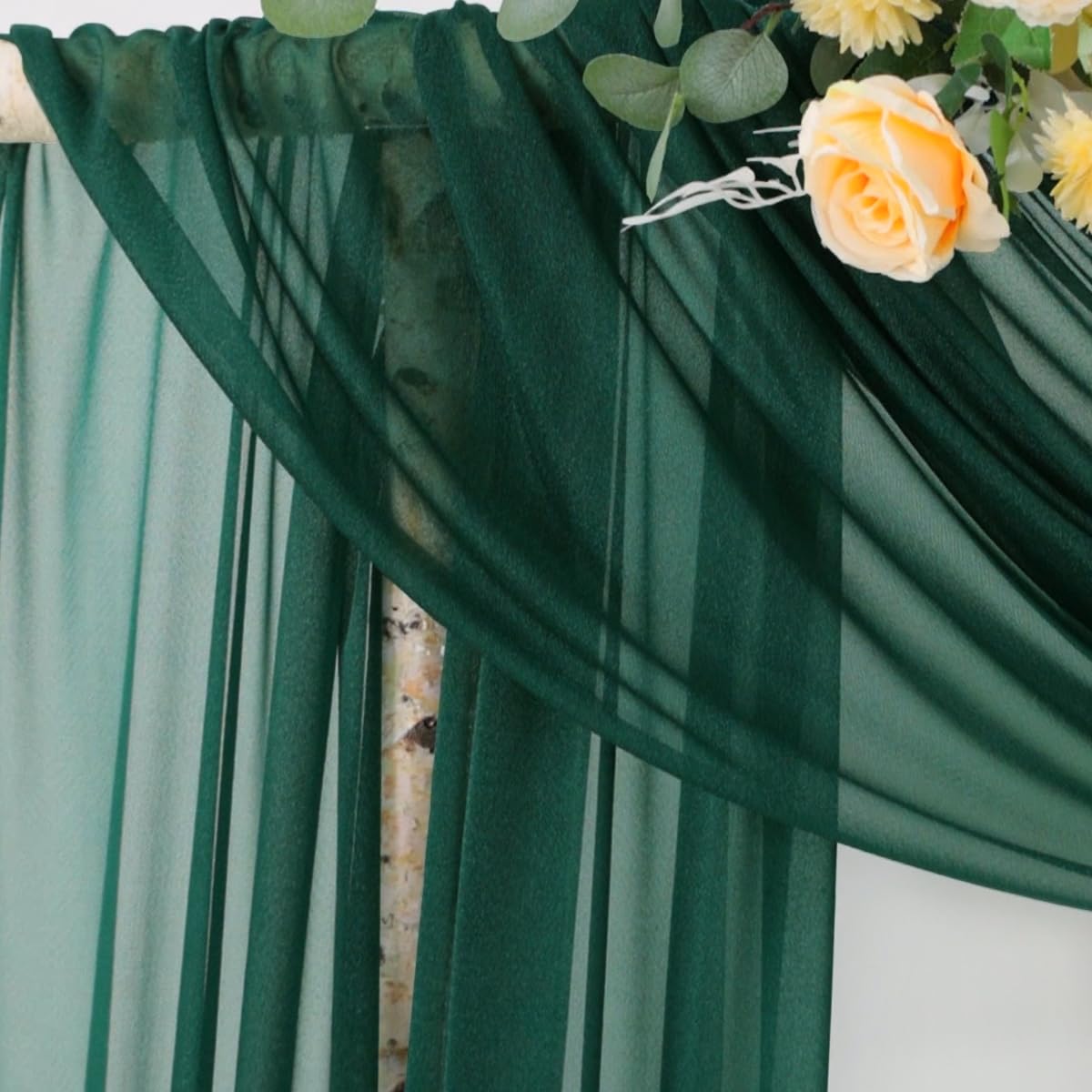 Socomi arch drape flowing softly on a wedding arch for romantic folds