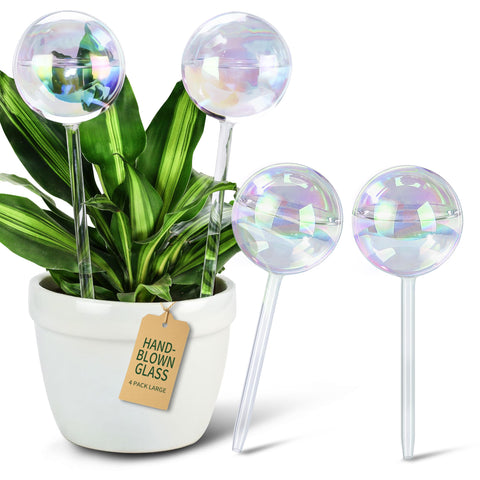 Soilagua rainbow glass watering globe shown casting iridescent light on a plant pot