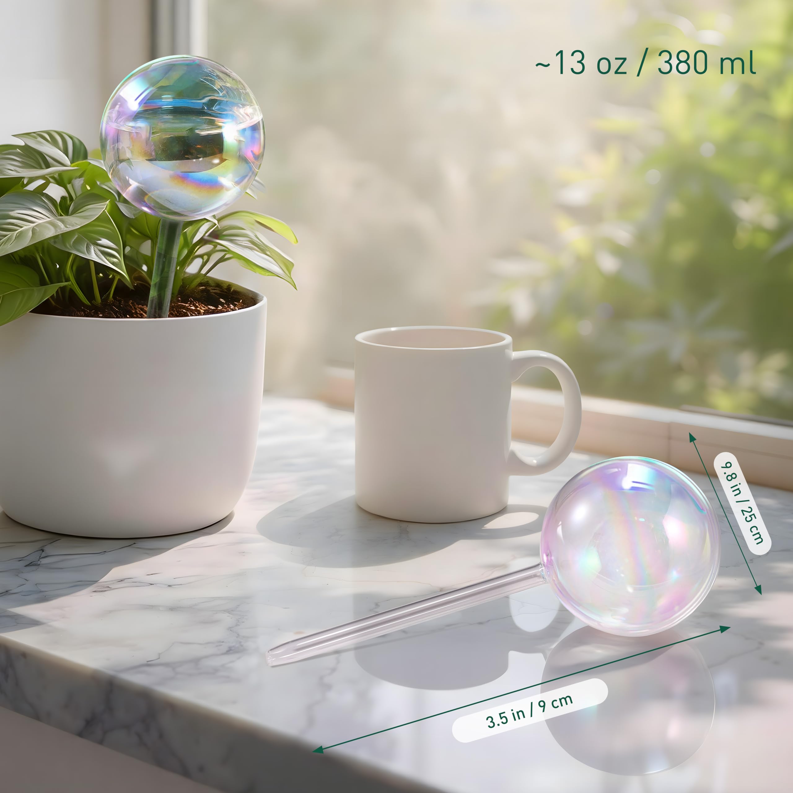 Soilagua large extra-thick glass globe with rainbow gradient in a planter