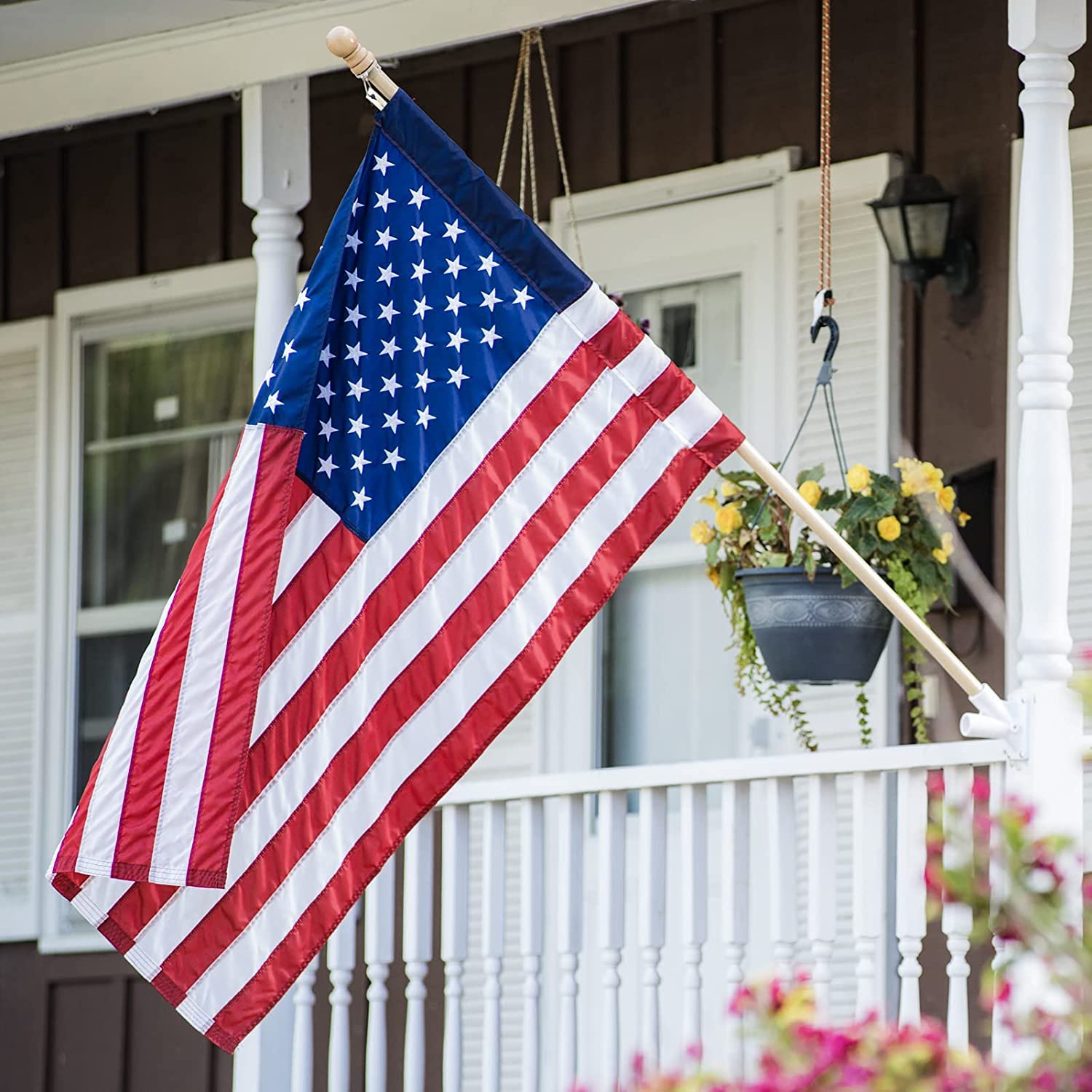 SolarStar American flag with pole sleeve for outdoor mounting.