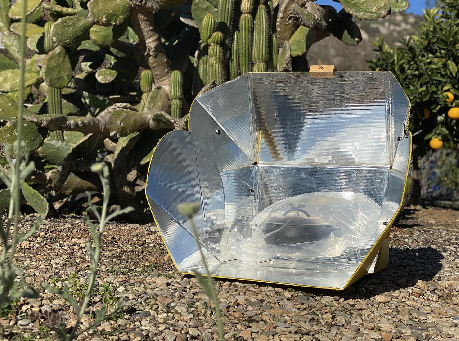 SOL COOK All Season Solar Cooker folded for compact storage.