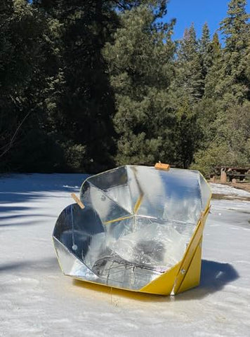 SOL COOK All Season Solar Cooker open for portable camping use.