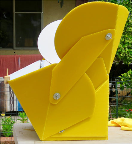 SOL COOK solar cooker with foldable frame for quick setup.