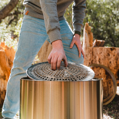 Solo Stove Bonfire with carrying case demonstrates portable warmth on the go