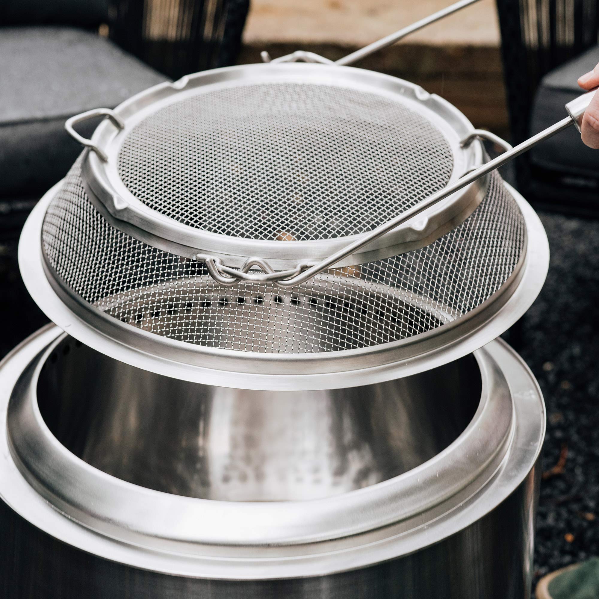 Solo Stove Bonfire Shield keeps embers contained on wooden decks.
