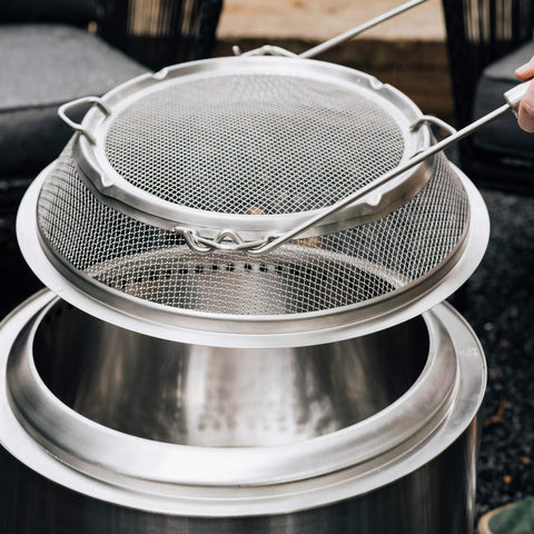 Solo Stove Bonfire Shield keeps embers contained on wooden decks.
