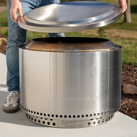 Solo Stove Yukon Lid overnight safety cover contains ash and embers after use.