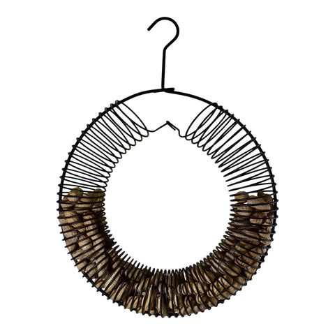 Songbird Essentials black wreath blends with surroundings to attract birds without drawing attention.