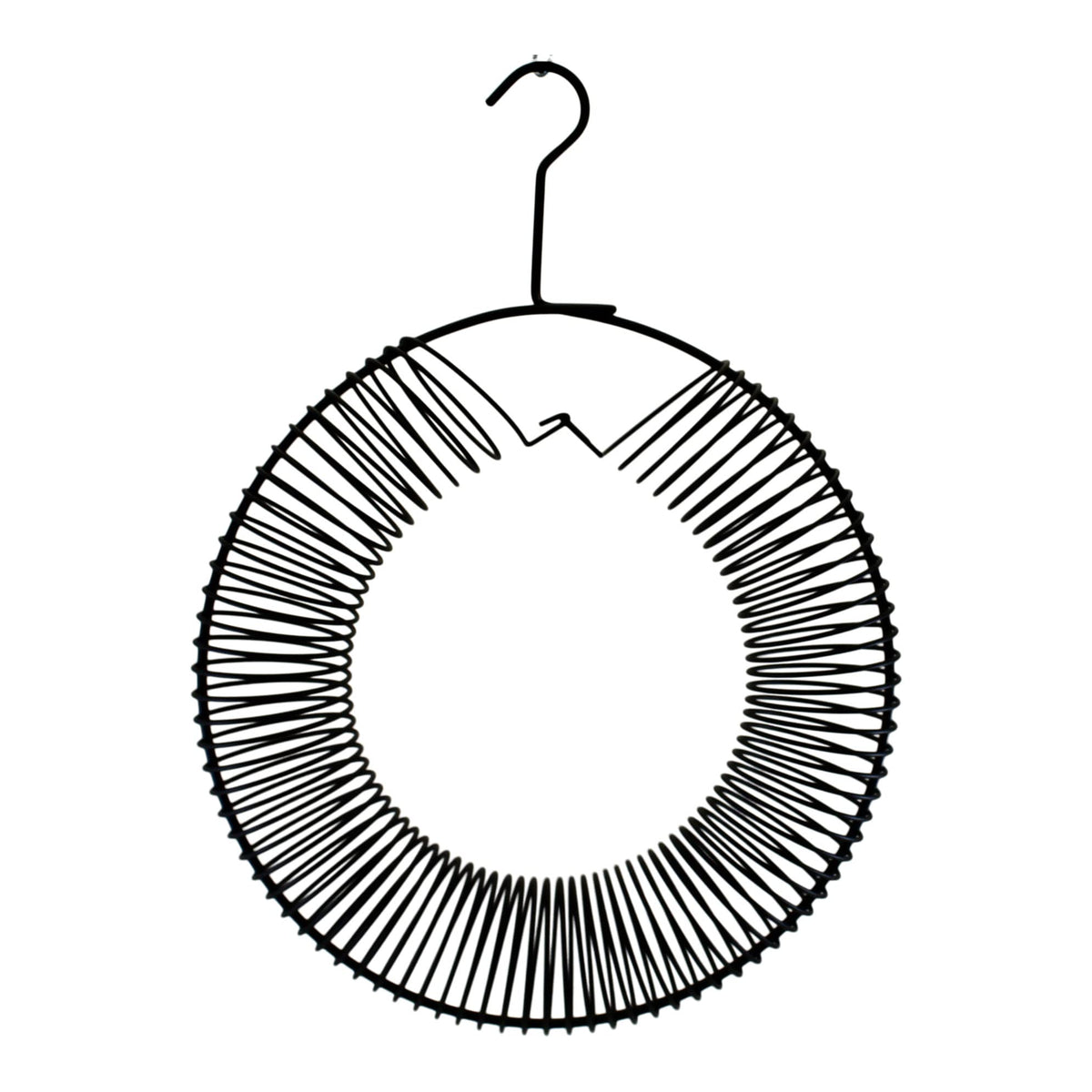Songbird Essentials whole peanut wreath feeder in black enables blue jays to pick shelled peanuts.
