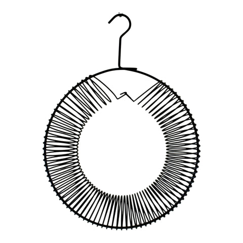 Songbird Essentials whole peanut wreath feeder in black enables blue jays to pick shelled peanuts.