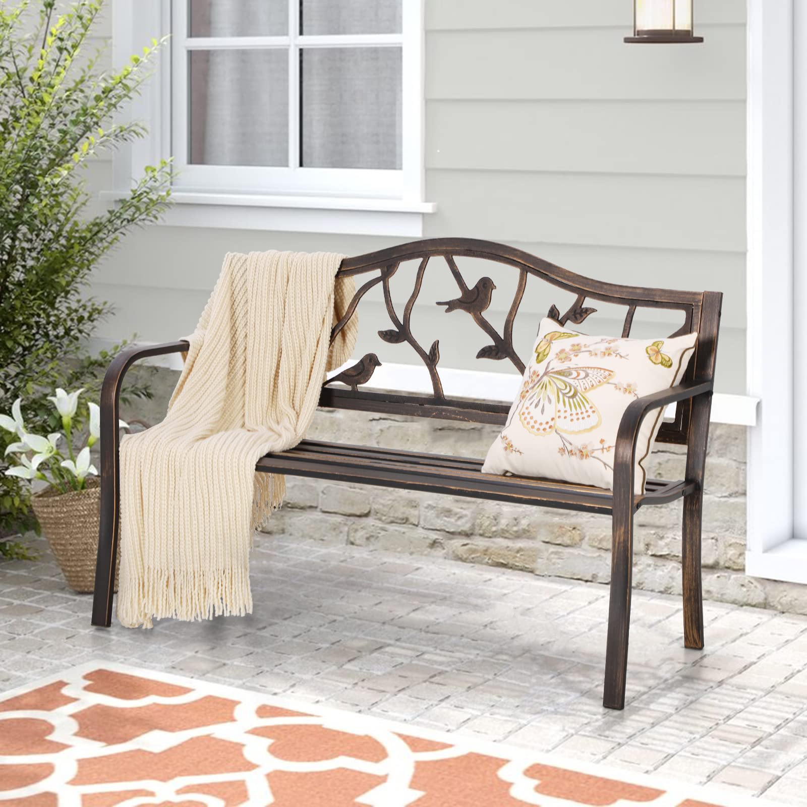 Sophia and William wrought iron armrests offer durable comfort in any outdoor space