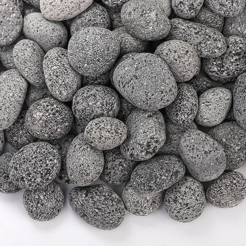SOUJOY lava rocks for fire pit 1-2 inch stones arranged for even flame distribution.