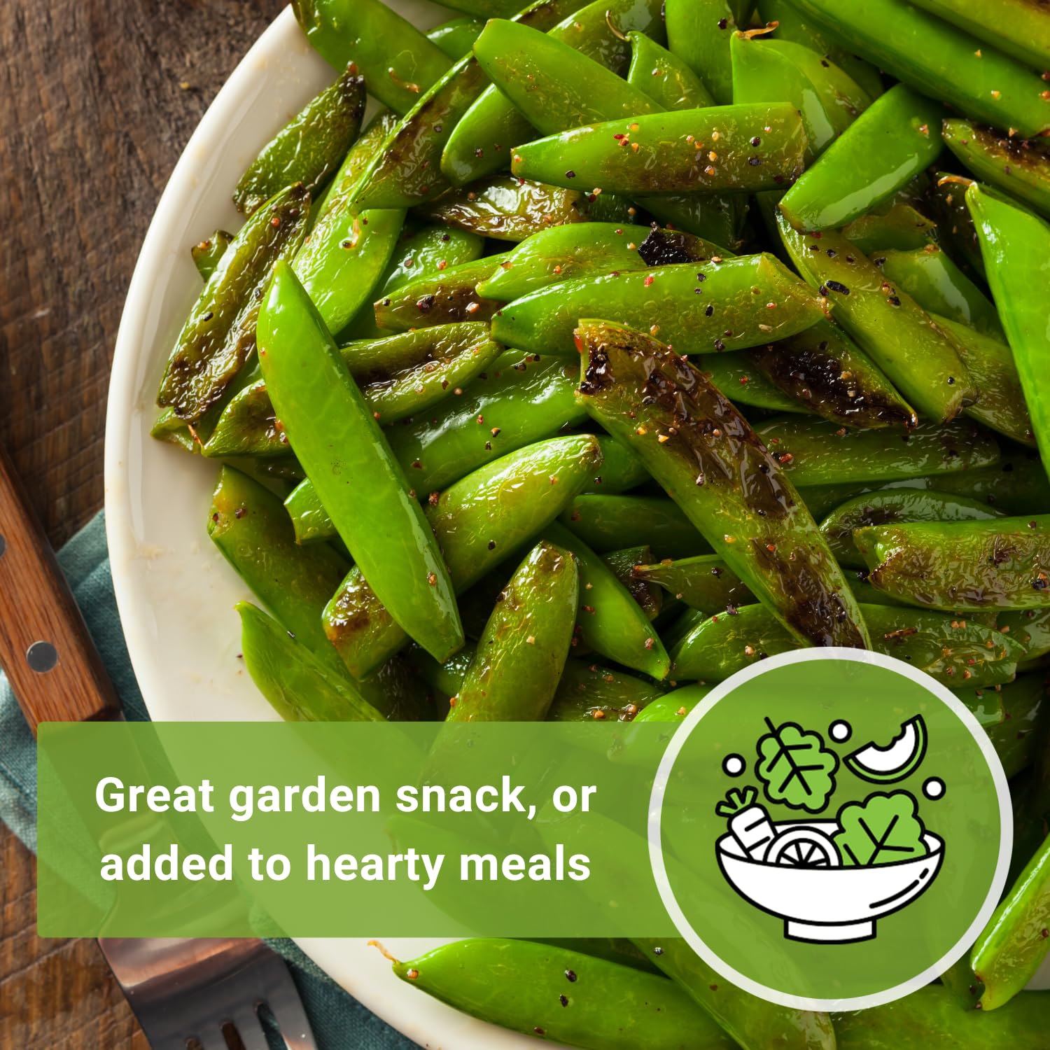 Sow Right Seeds garden plot with sugar snap peas on a trellis.