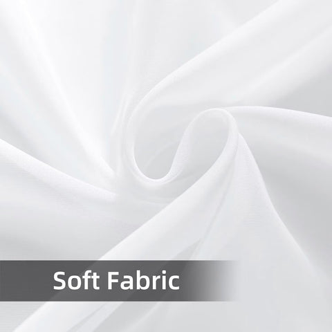 SpaceDresser curtains drape over outdoor space creating a soft, elegant backdrop.