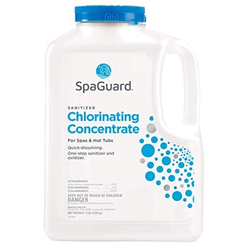 SpaGuard Spa Chlorinating Concentrate granules dissolving in water for fast spa disinfection