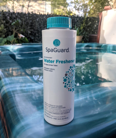 SpaGuard Water Freshener being poured into spa water shows odor removal without altering pH.