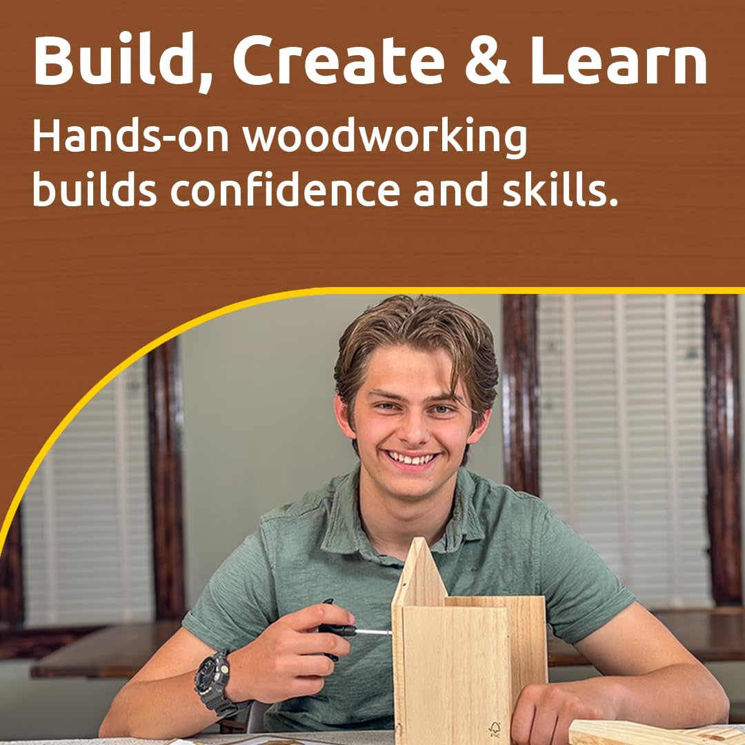SparkJump Cottage Birdhouse Kit assembled outdoors supports family DIY fun.