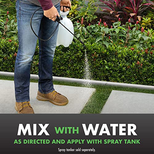 Sprayer applying Spectracide Triazicide for even lawn coverage