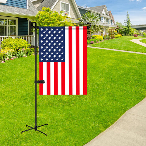Spirepro flag stand shows wind clip keeping banners secure in breezy weather.