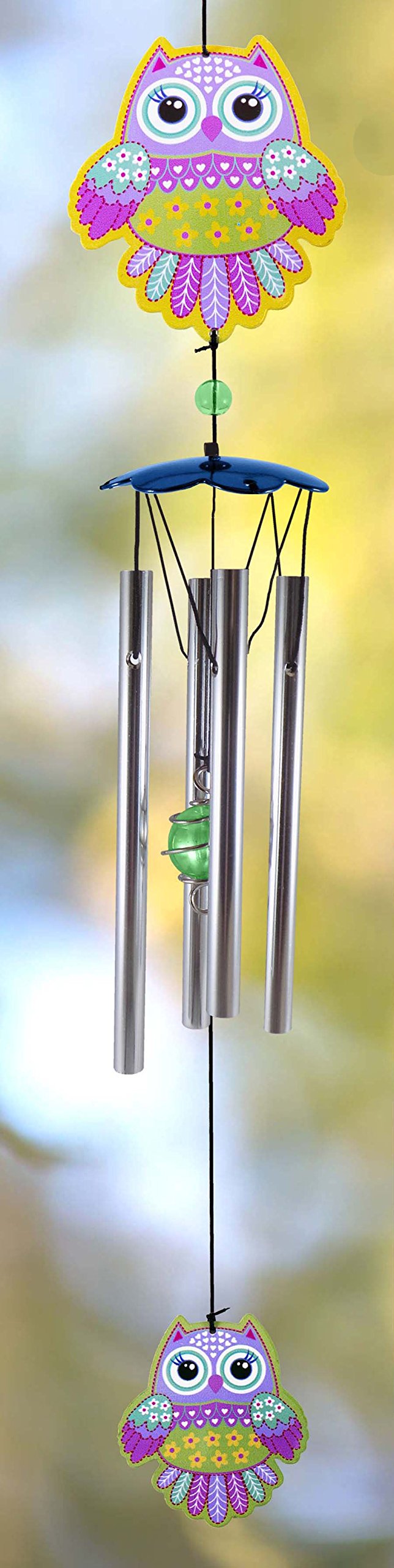 Close-up of Betty Boop wind chime details showing character design and tuning tubes for pleasant tones
