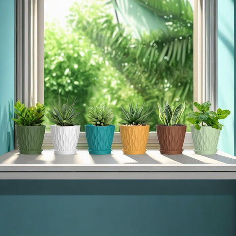 SQKH planter pots on a windowsill ready for small plants