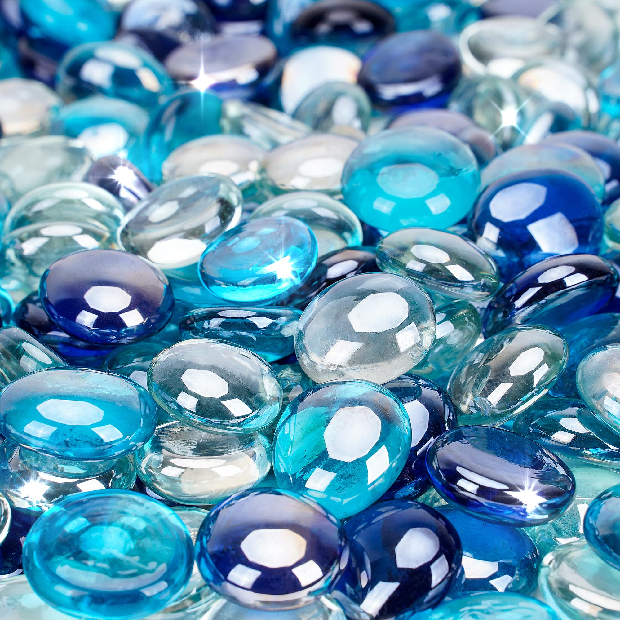 Stanbroil fire glass drops cobalt blue shimmer in a gas fire pit.
