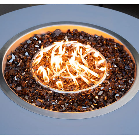 Stanbroil outdoor fire pit glass display adds color while replacing lava rocks.