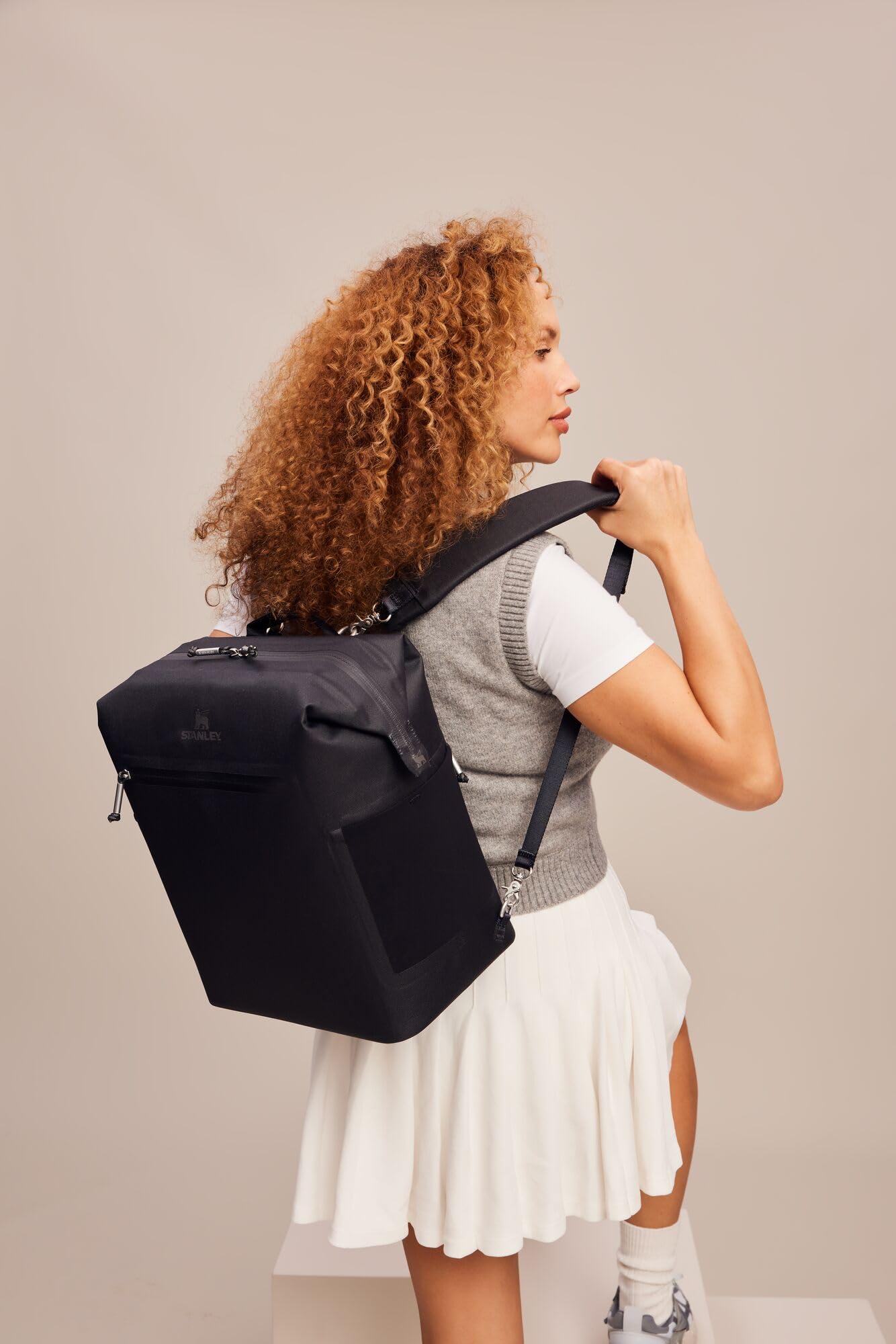 Stanley All Day Madeleine Midi Backpack mesh-side-pocket keeps beverages within easy reach.