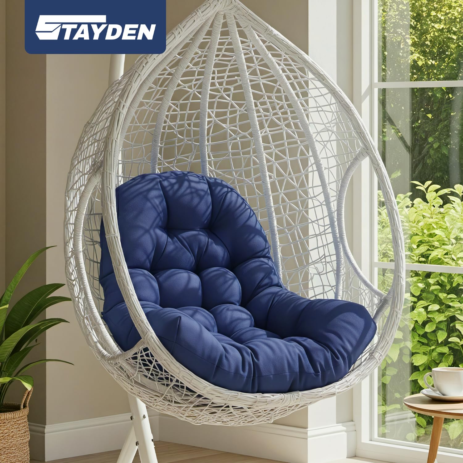 Stayden blue egg chair cushion, side view, ergonomic comfort outdoors.