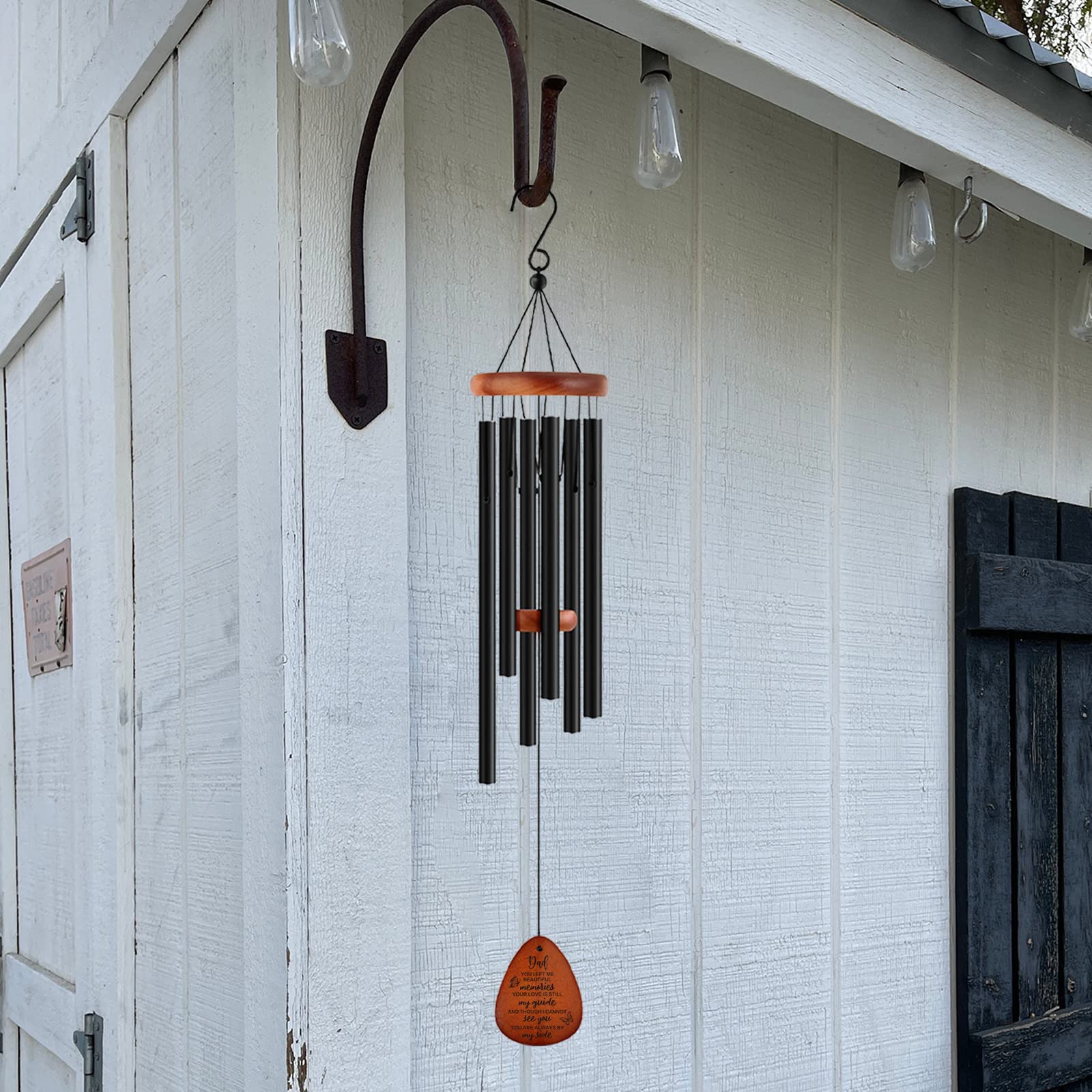SteadStyle memorial wind chimes in the garden, creates a lasting tribute.