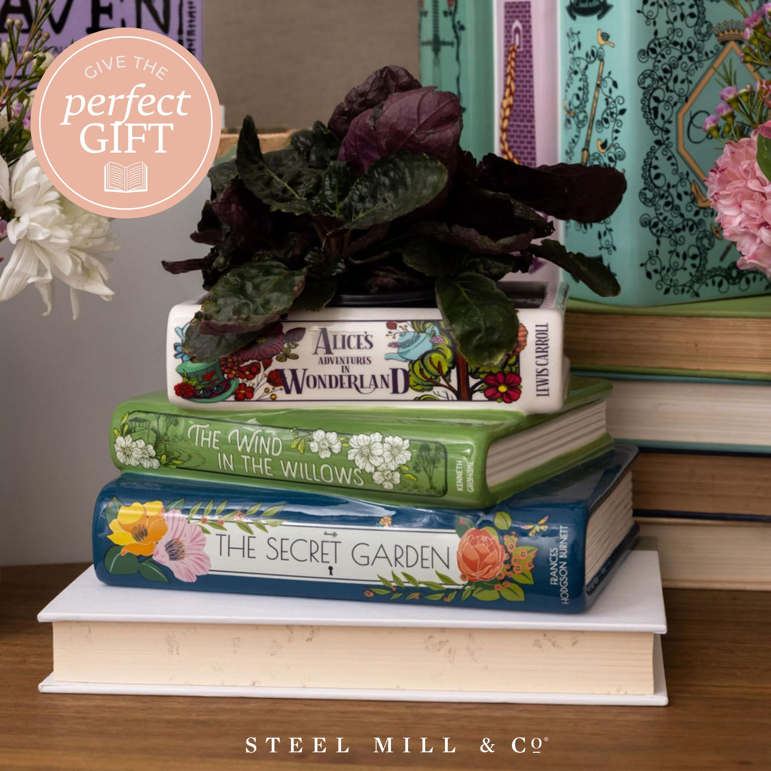 Steel Mill & Co book planter top opening hosts small plants or desk items.