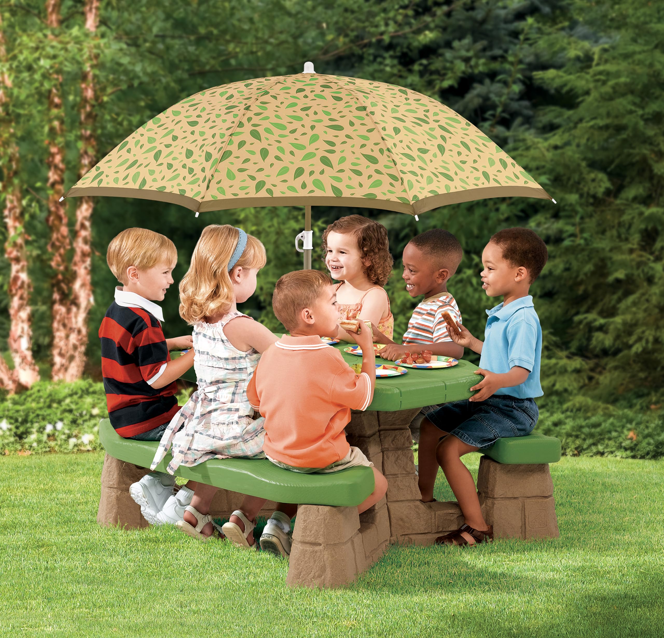Step2 Naturally Playful picnic table backyard scene showcases versatile indoor/outdoor use.
