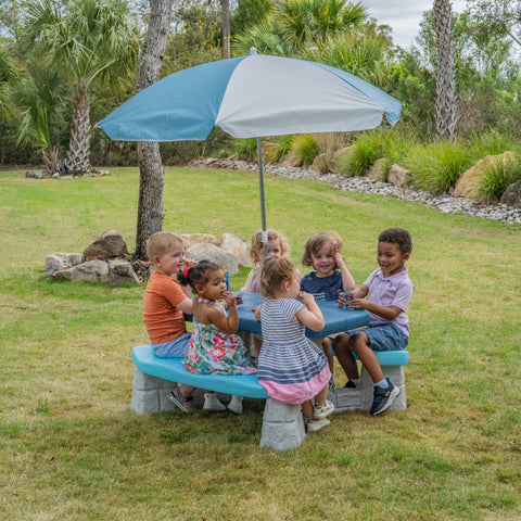 Side view of Step2 Sun & Fun Picnic Table highlighting sturdy plastic.