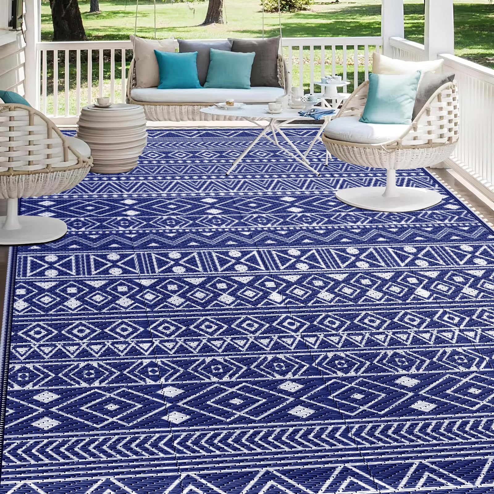 StepLively outdoor rug in blue with reversible design enhances patio seating and style