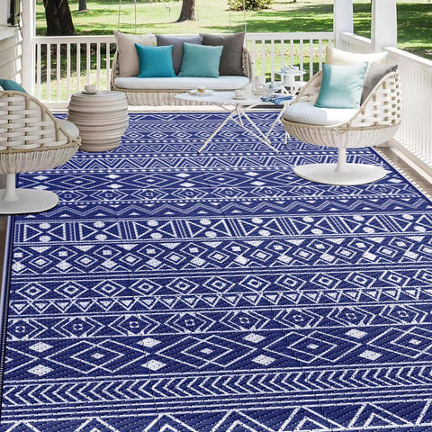 StepLively outdoor rug in blue with reversible design enhances patio seating and style